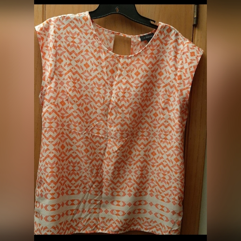 The limited Orange and white Suiting top Size Large